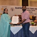 Director Tourism, Dr. Rashmi sharma presenting a Heritage Certificate at RDTM Road Show.